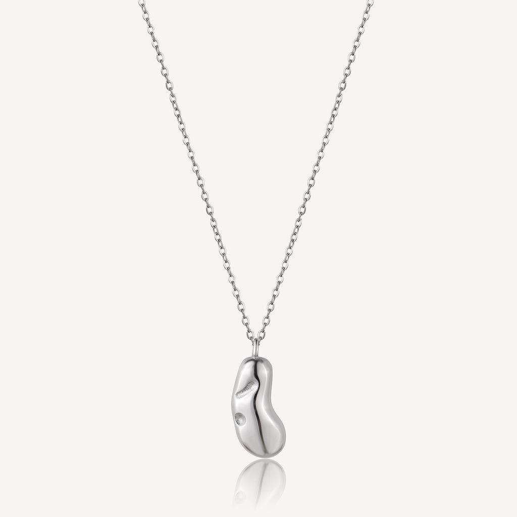 Silver necklace with a unique pendant on a white background
