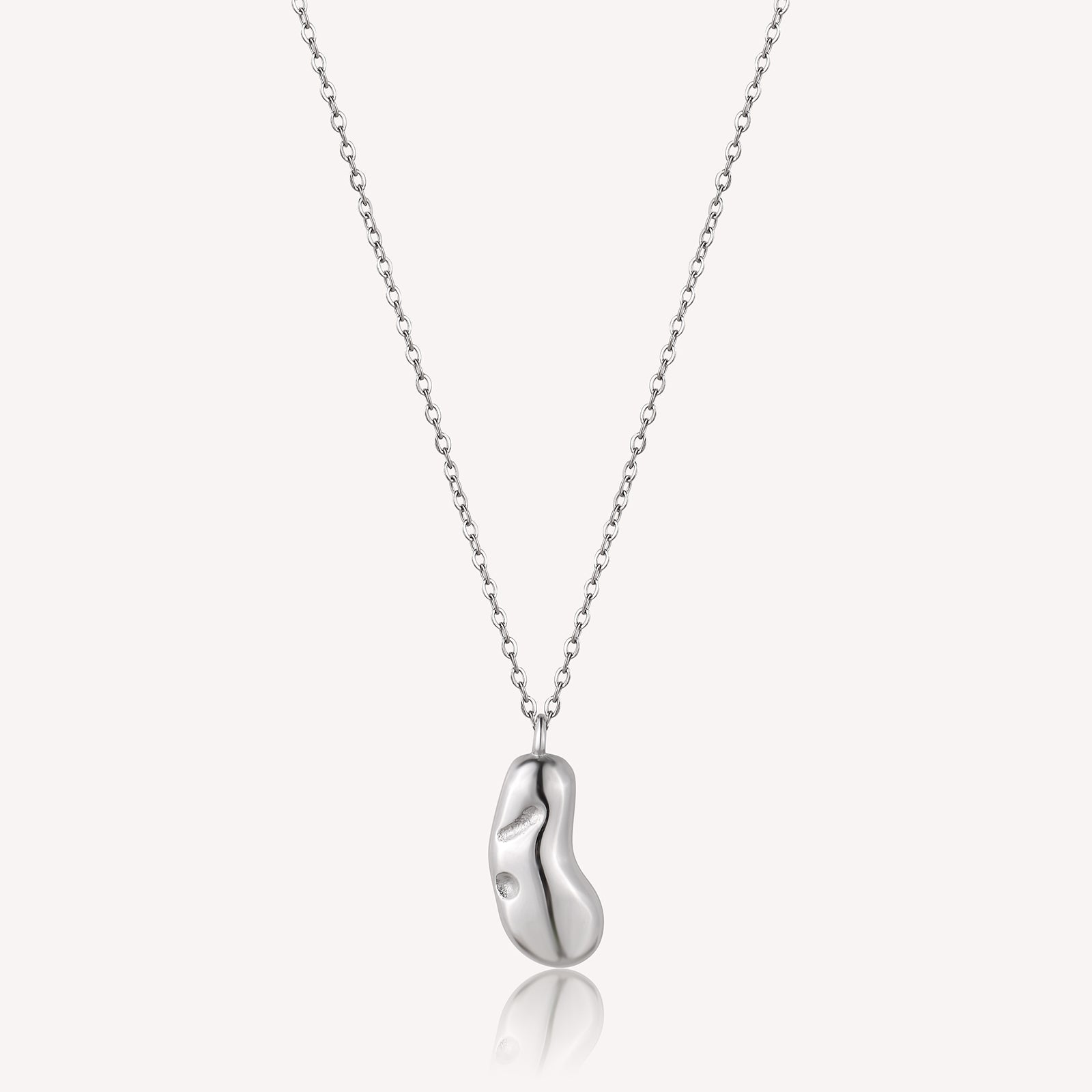 Silver necklace with a unique pendant on a white background